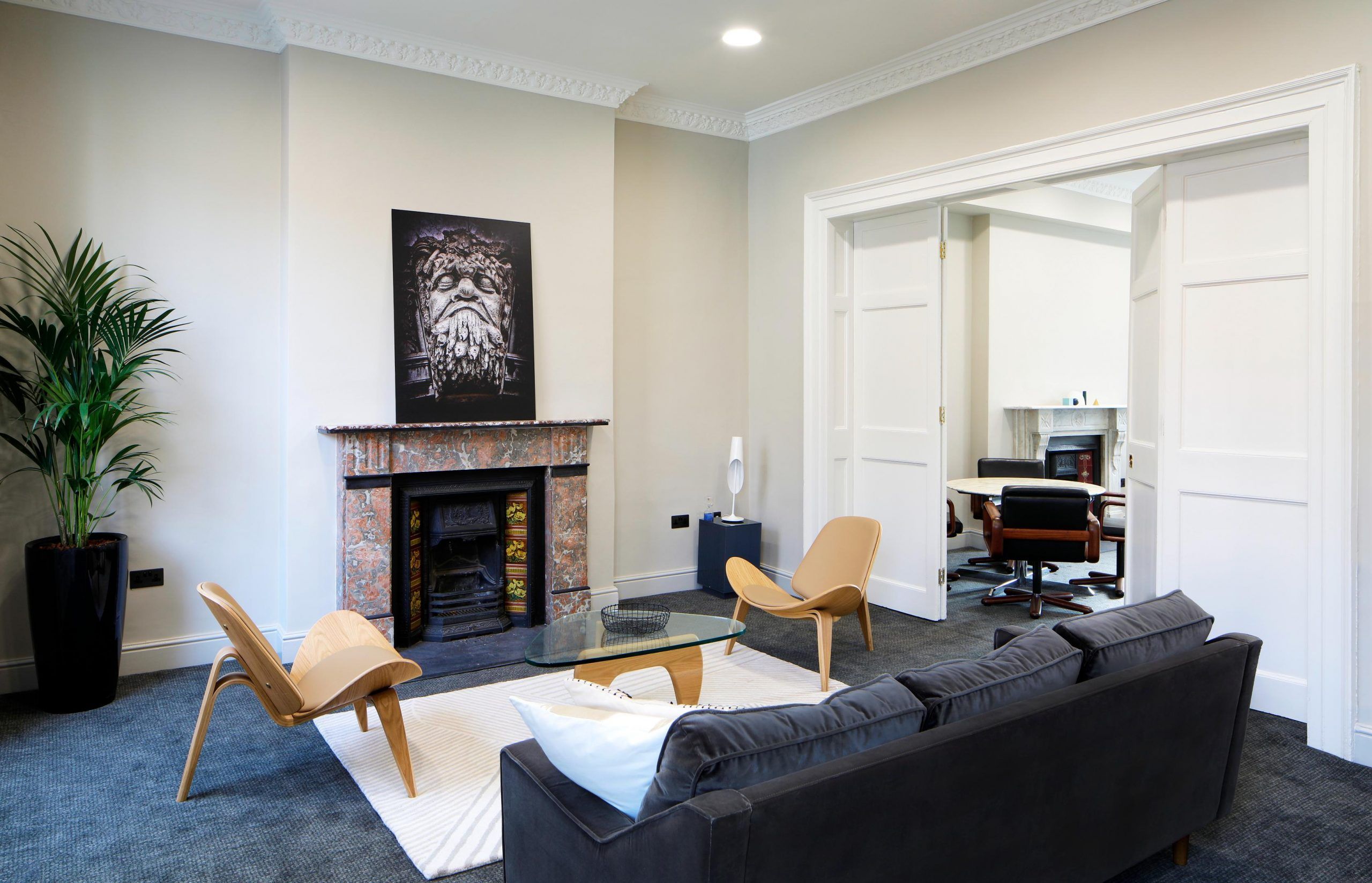 128 Lower Baggot Street, Dublin 2 - flexible office space - breakout area with couch and fireplace
